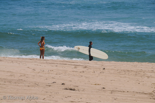 Girl with Orange Bikini and Surfer